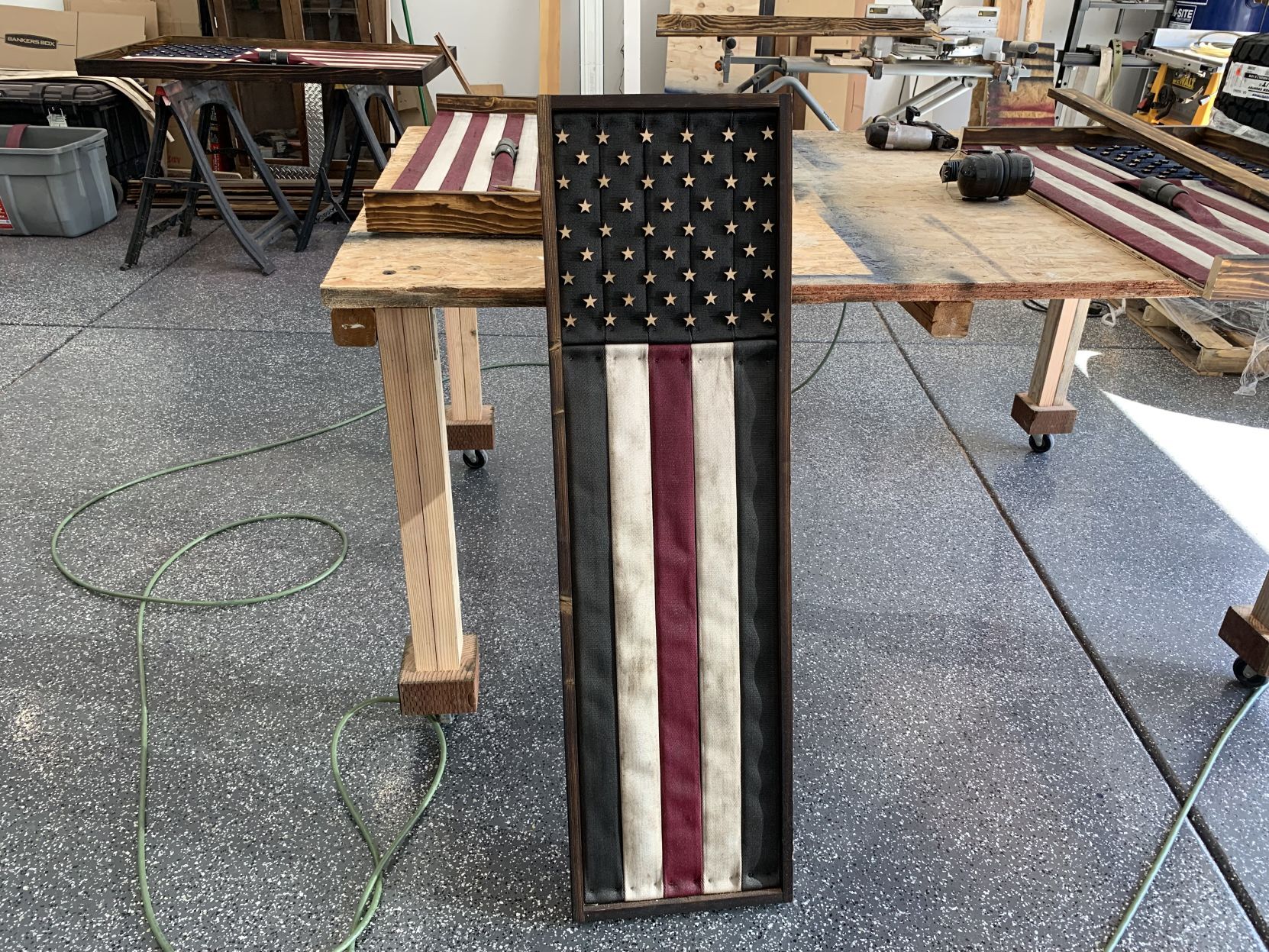 Making flags from recycled fire hoses in Napa
